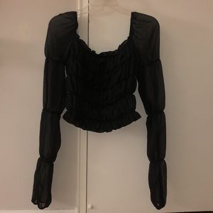 Cropped long sleeve black ruffle top